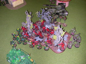 Some plague marines assault the Kroot in a forest