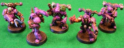 Five Purple Plague Marines