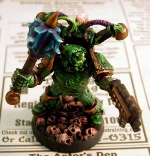 Chaos Lord armed with Bolter and Power Weapon